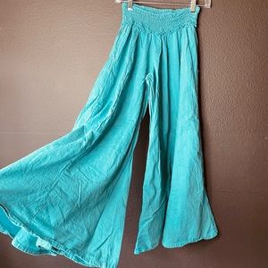 Super cute very wide leg palazzo pants. Light teal.